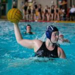 Harriet Dickens playing Water Polo